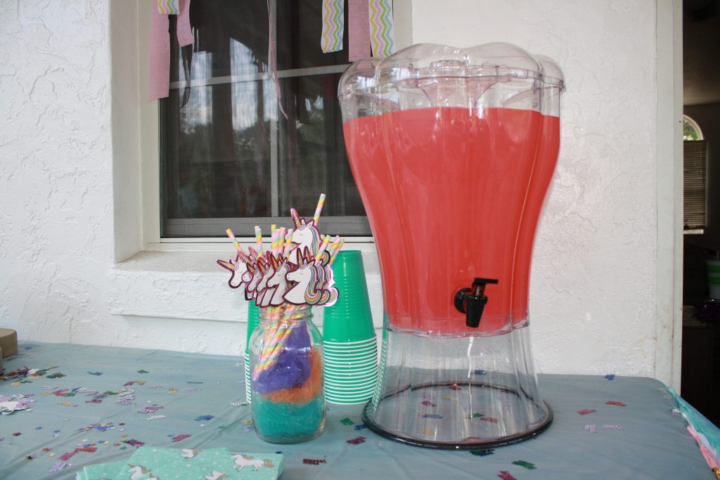 Unicorn birthday party drink station