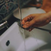 hand washing dishes