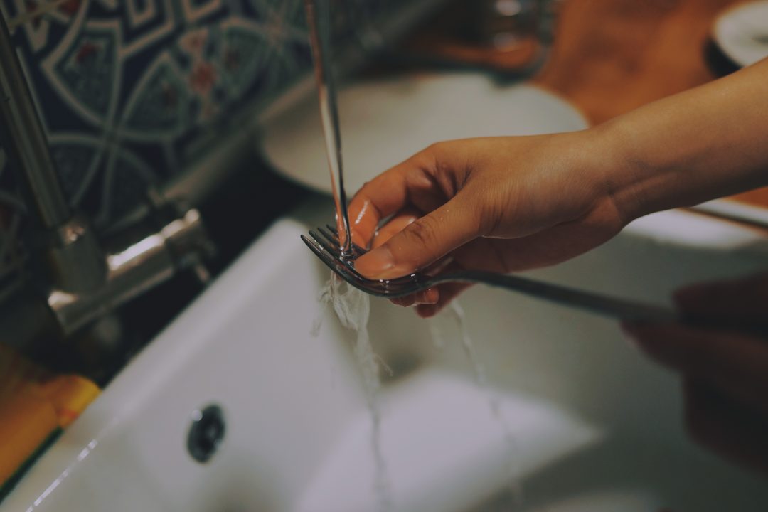 hand washing dishes