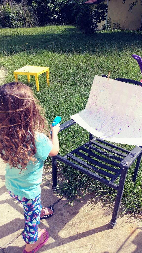 Water gun painting. a cheap and mess free project for kids.