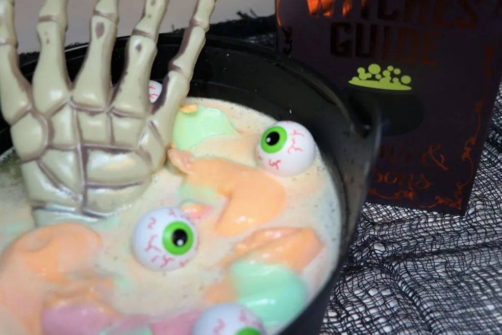 This spooky Witch's Brew Punch is made with 3 simple ingredients and will make any Halloween Party a creepy winner FrighteninglyFunFlavors #ad