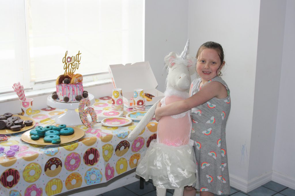 birthday girl at her donut birthday party