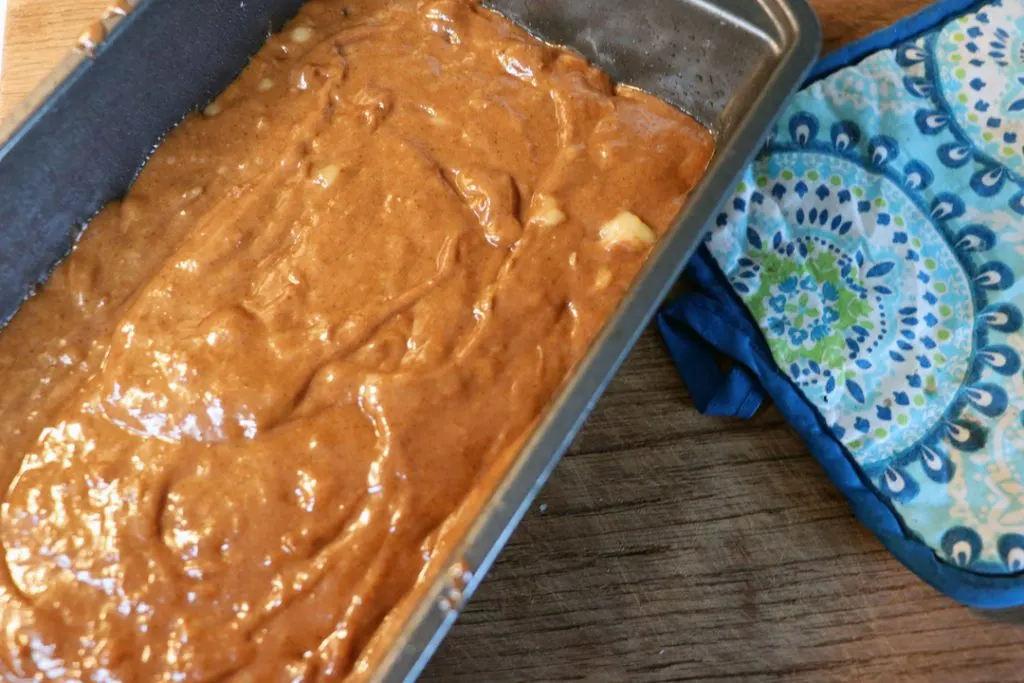 banana bread batter in a pan waiting to be cooked