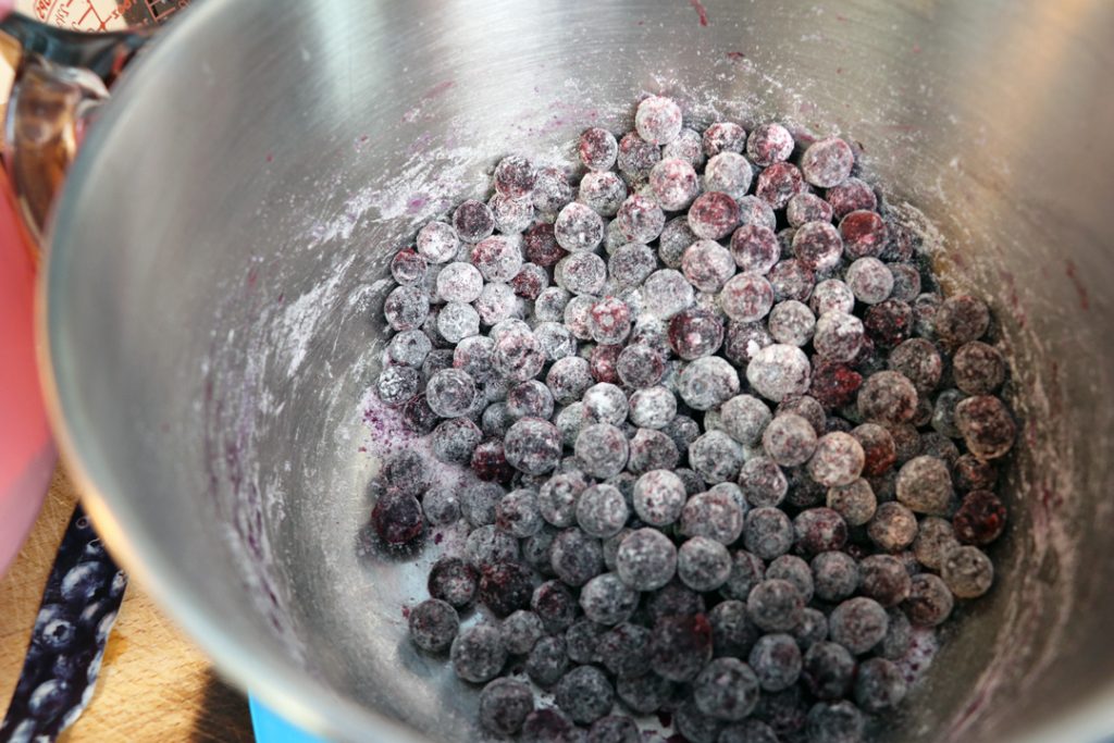 blueberries coated with flour for baking