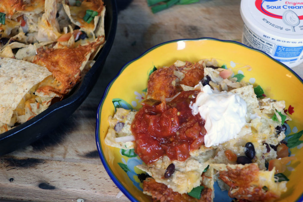 Chicken Nachos in a cast iron pan