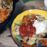 Chicken Nachos in a cast iron pan