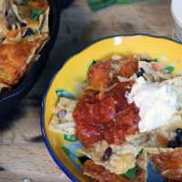 Chicken Nachos in a cast iron pan