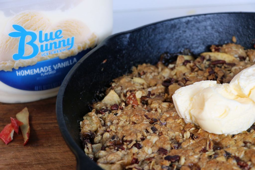 Apple Crisp in cast iron with vanilla ice cream