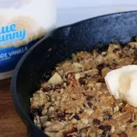 Apple Crisp in cast iron with vanilla ice cream