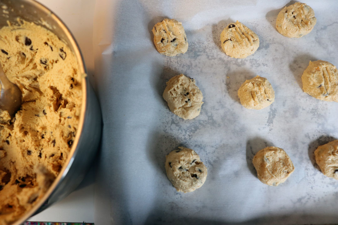 cookie dough in bowl and on the tray