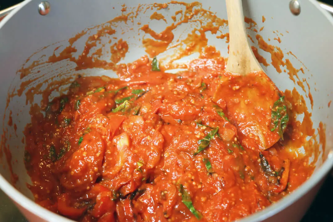 thick and chunky creamy tomato basil soup with roasted fresh tomatoes