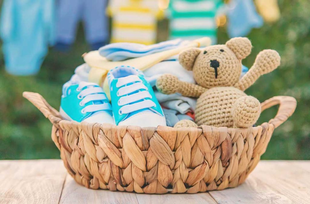 Pregnancy-themed gift basket with self-care items