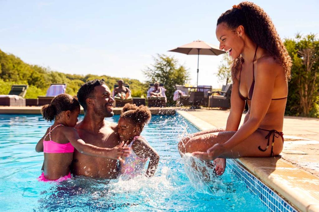 Family enjoying pool at all-inclusive resort