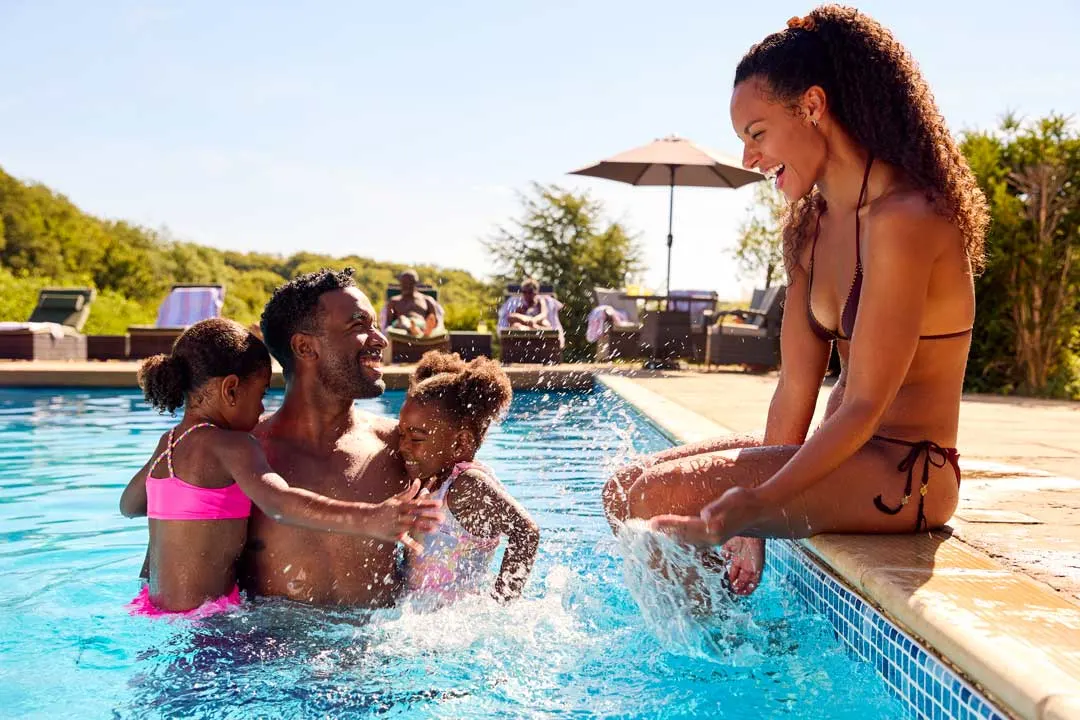 Family enjoying pool at all-inclusive resort