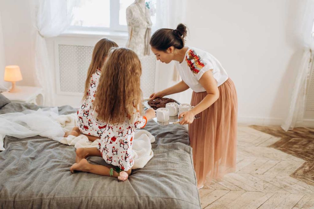 Family preparing outfits for a photo session