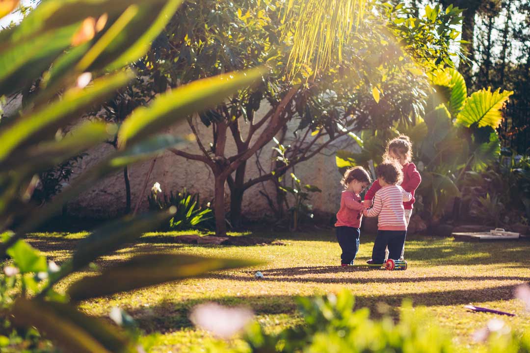 kids playing in family-friendly backyard