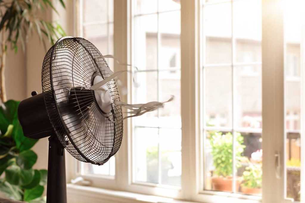 Industrial-strength fan for cooling a room