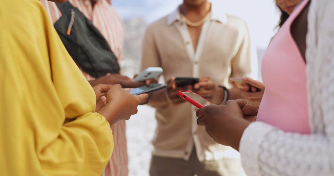 Image of diverse people using mobile wallets