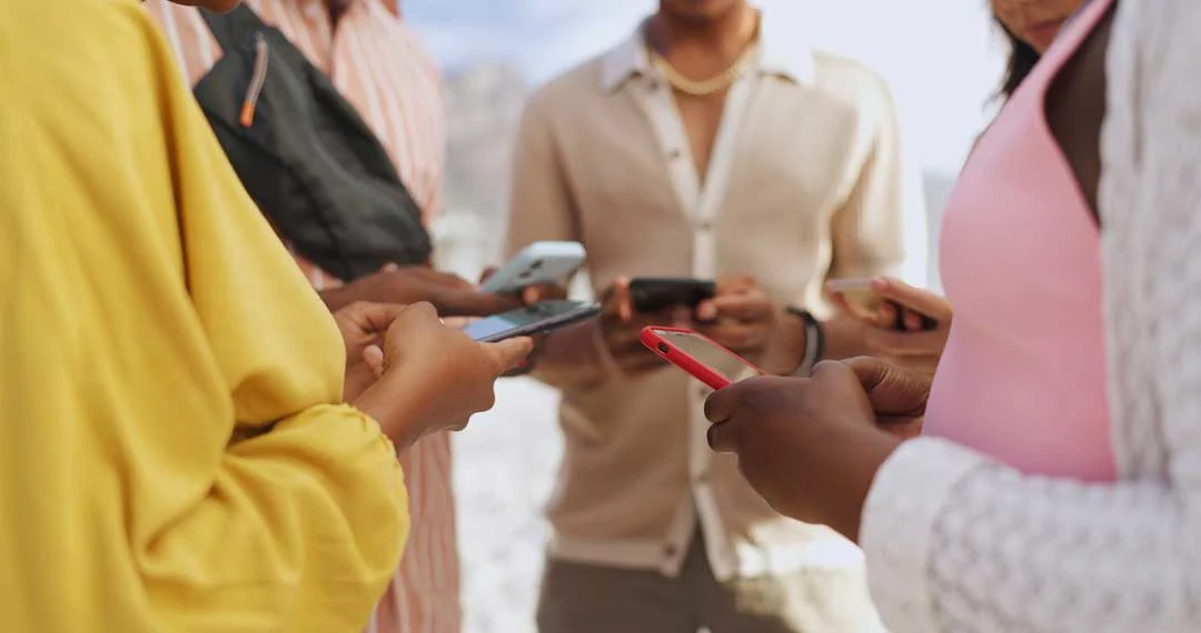 Image of diverse people using mobile wallets