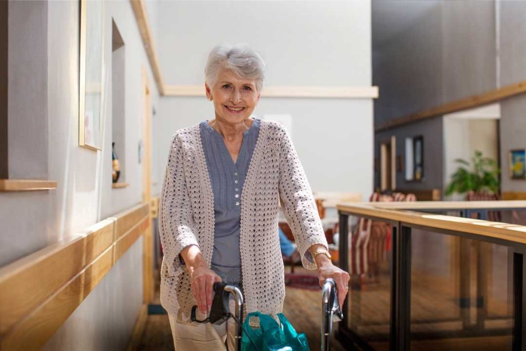 Fall prevention with mobility aids in a bright hallway