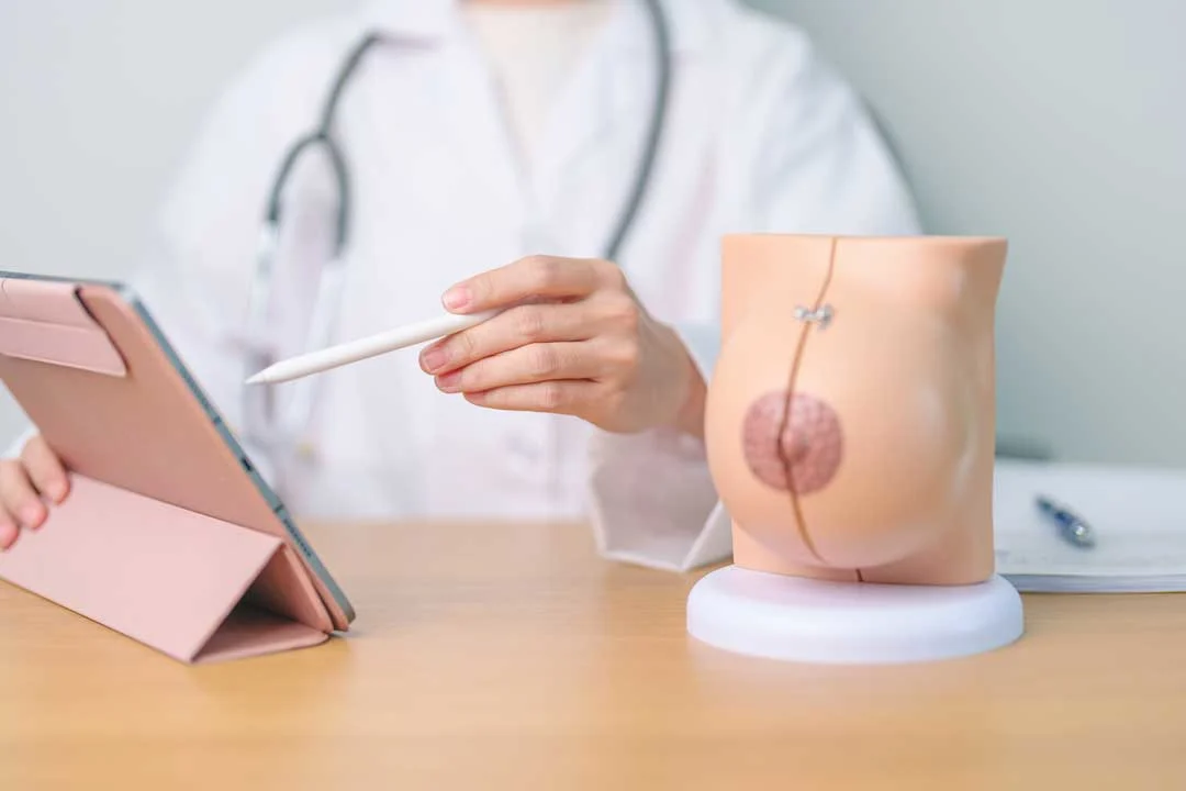 Surgeon explaining internal bra breast lift technique