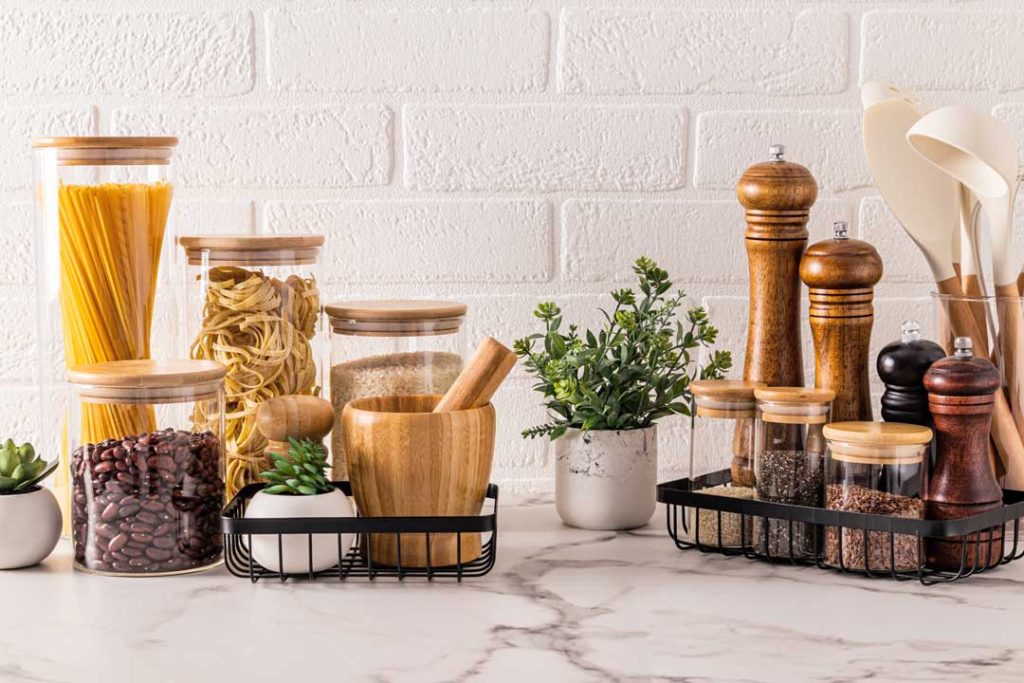 Organized kitchen counter using tiered rack for clutter control