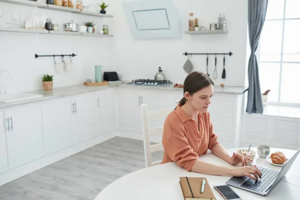 Working mom using planner to stay organized