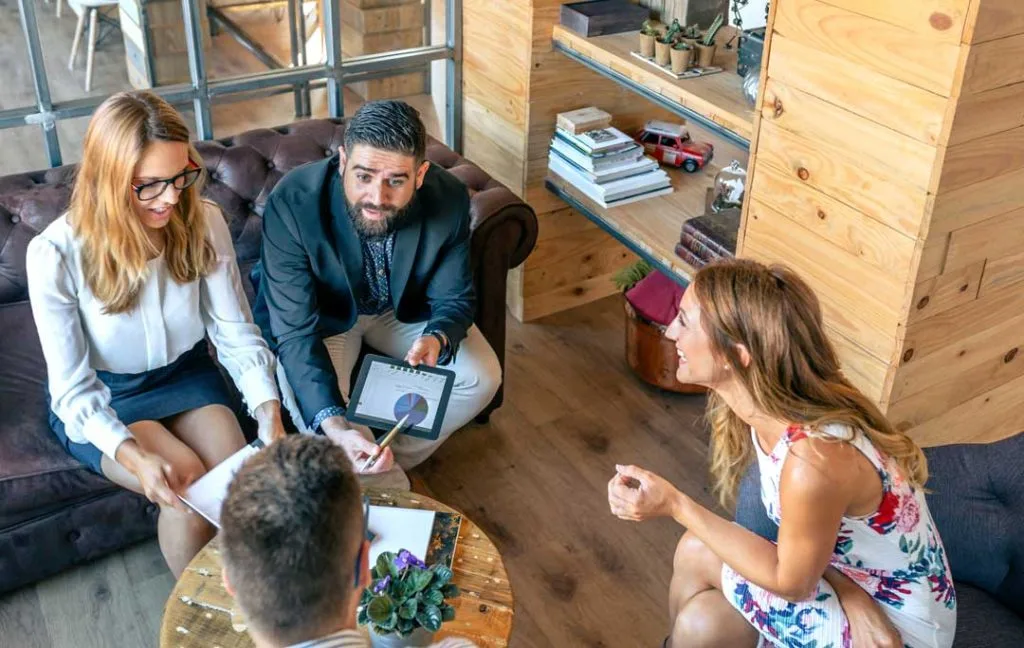 airbnb managers meeting with a homeowner