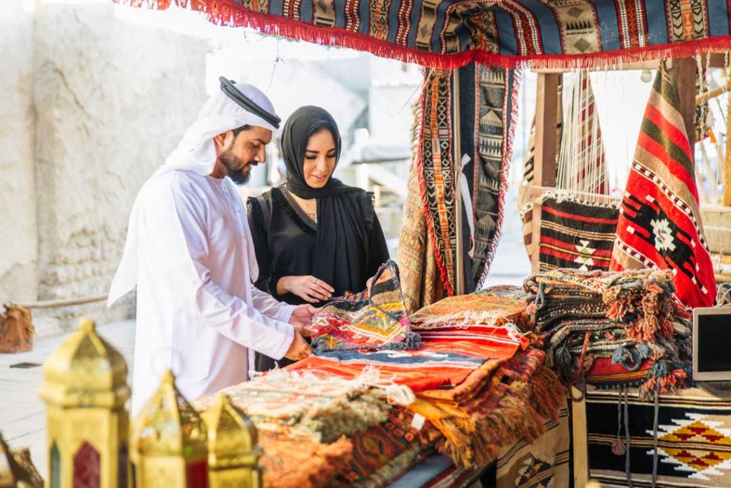 ourist shopping for traditional goods in Abu Dhabi