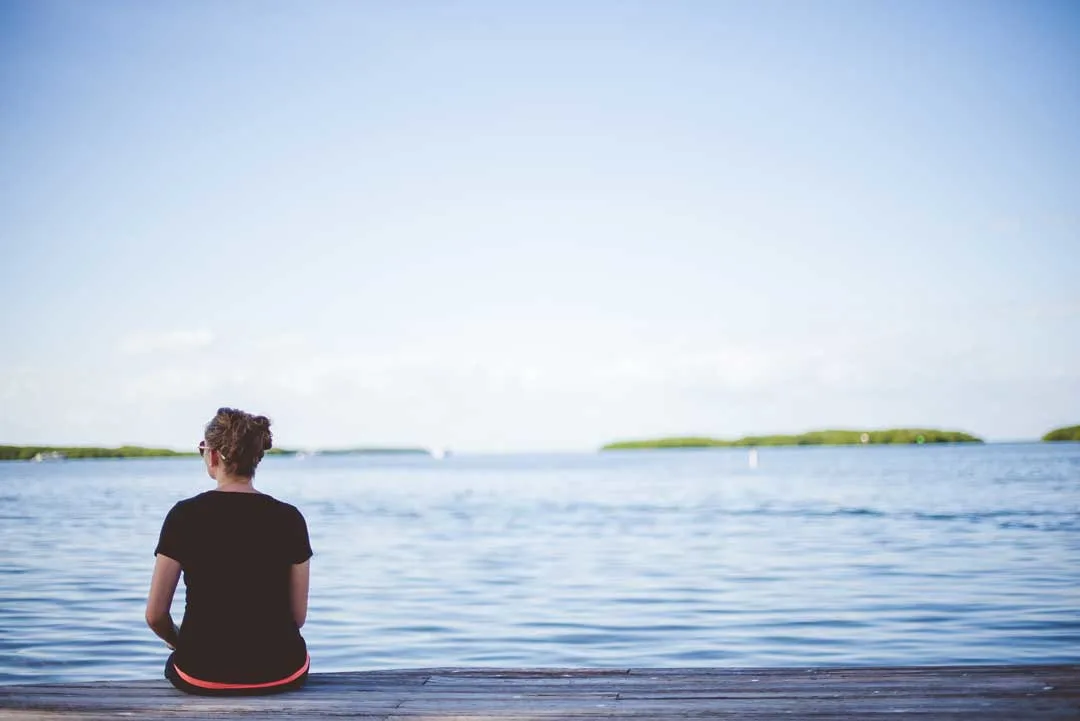 Unplug on vacation by relaxing near water