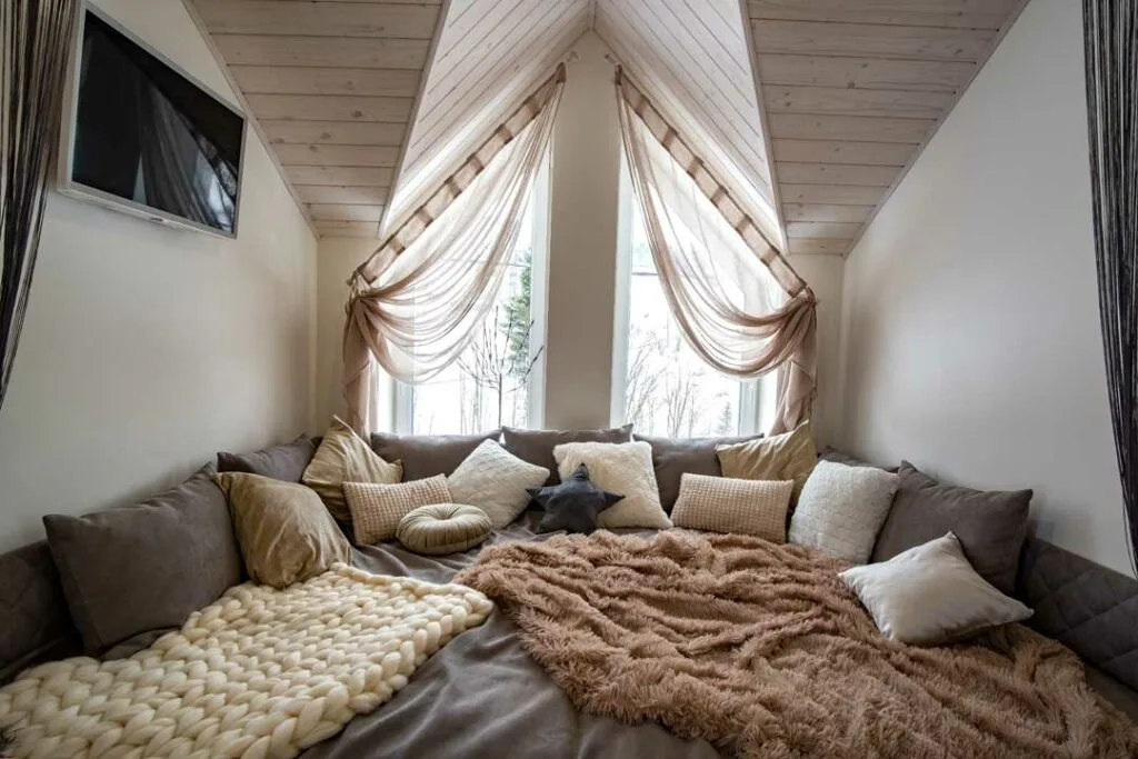 Comfortable couch setup with pillows in cheerful home interior