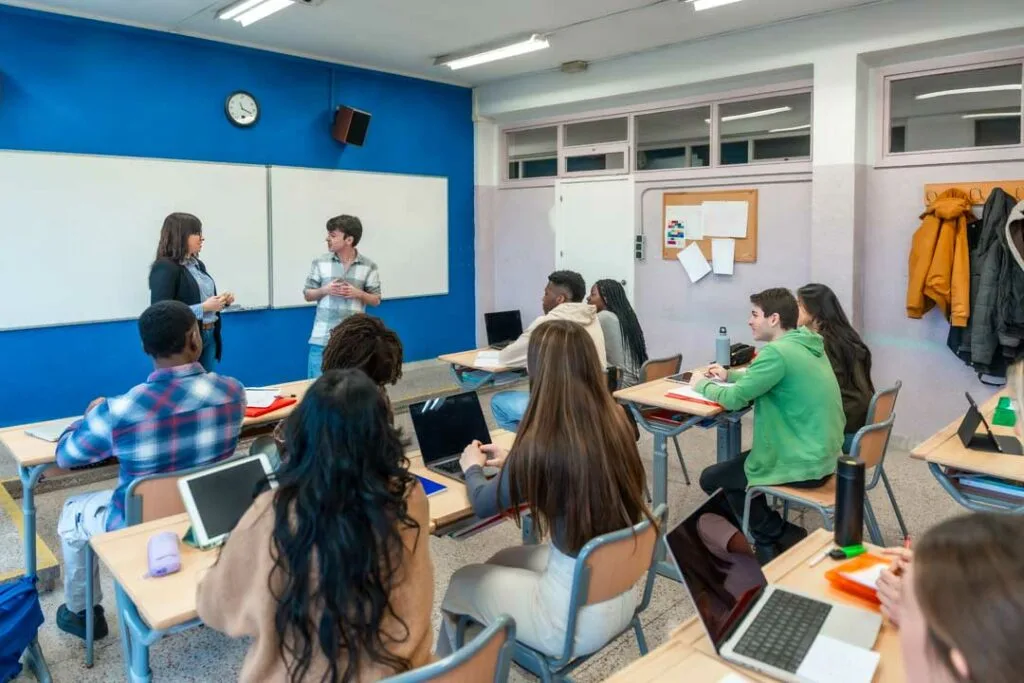 Diverse students using modern technology in future-focused classroom