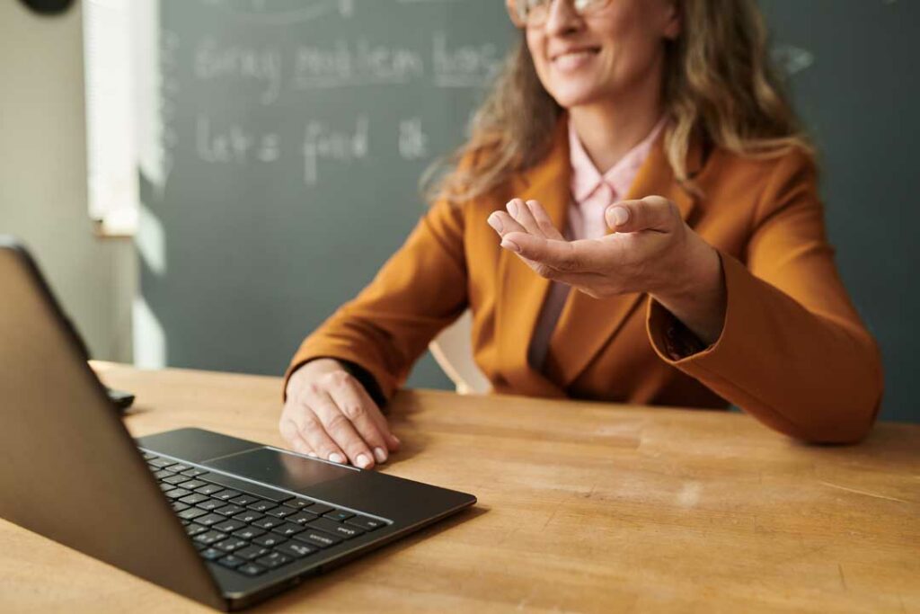 Teacher earning professional development degree through online learning