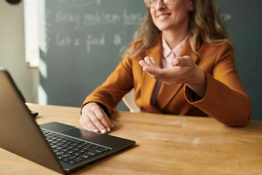 Teacher earning professional development degree through online learning