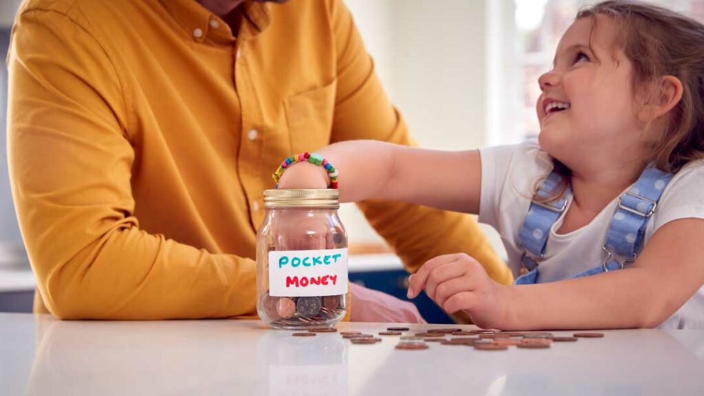 Visual money jars teaching preschoolers to save, spend, and share