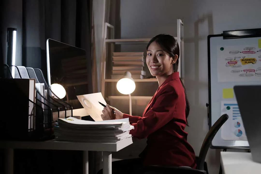 Remote worker in a casual blazer and t-shirt, exemplifying stylish work from home outfits