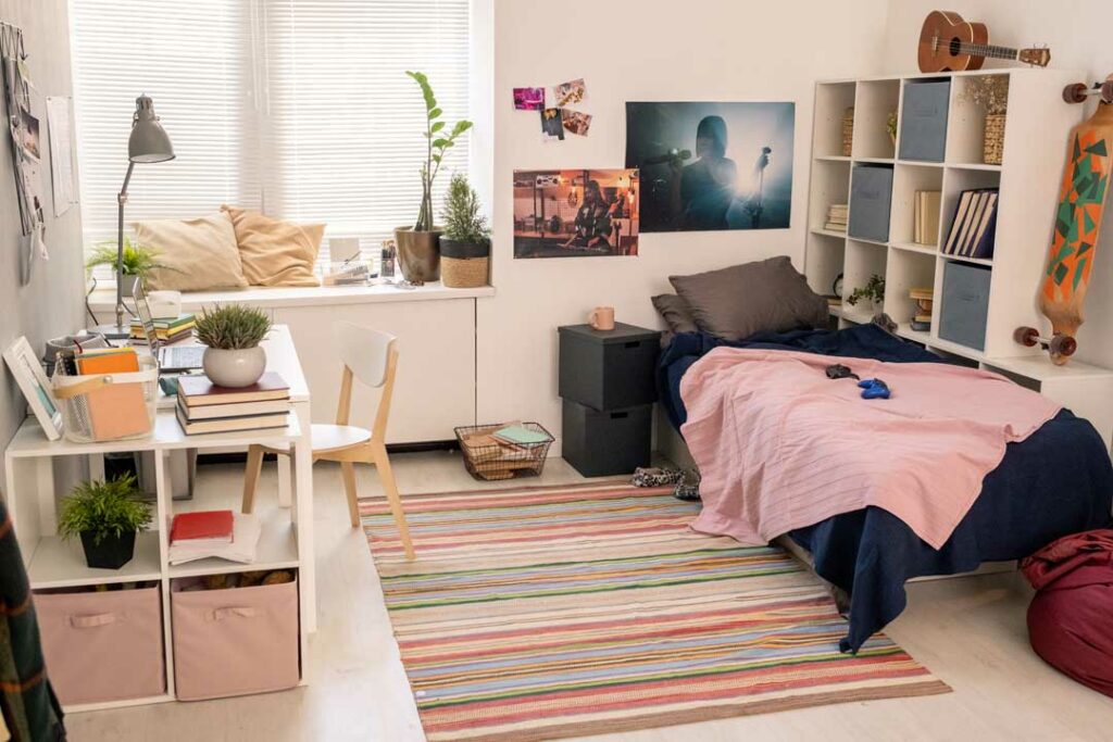 Multi-functional furniture in a small student room maximizing space and comfort