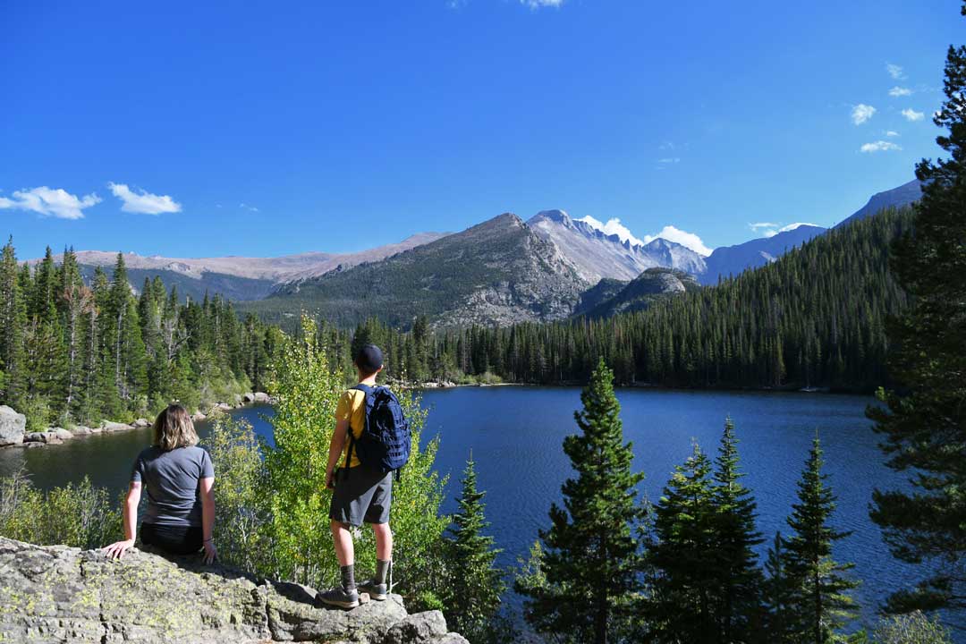 Family hiking with mountain views in Colorado