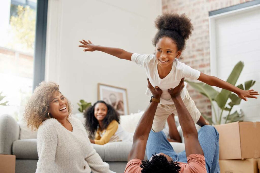 Happy parent enjoying family time without back pain