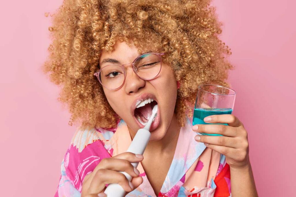 Person brushing teeth