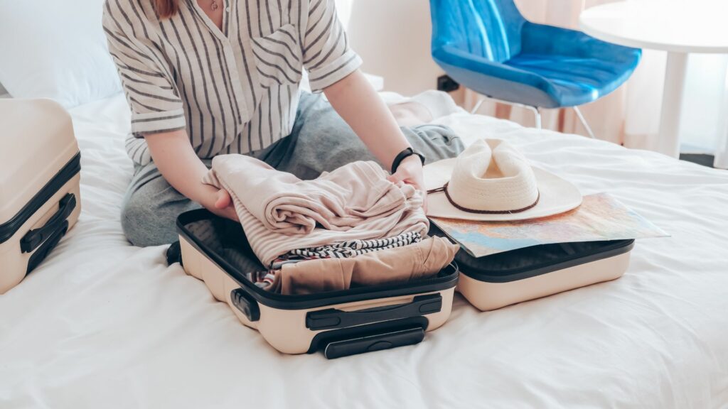 Working mom packing light for a weekend micro vacation with family